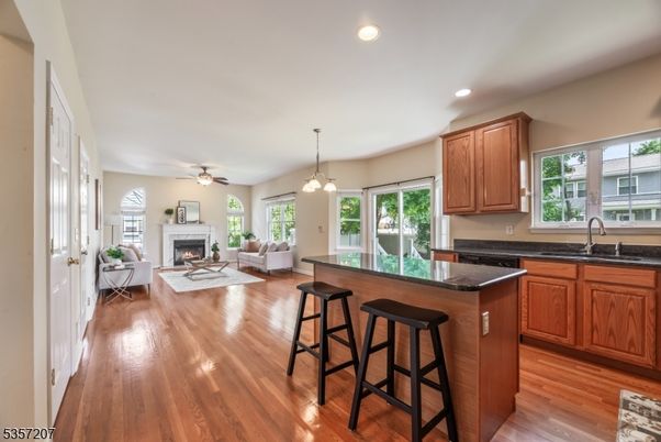Fireplace, Interior, Kitchen, Living room, Pendant Lights, Recessed Lighting, Wood Texture Flooring