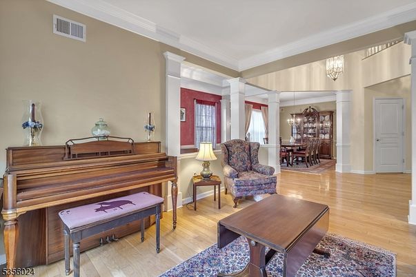 Chandelier, Dining room, Interior, Living room, Piano, Wood Texture Flooring