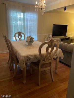 Chandelier, Dining room, Interior, Wood Texture Flooring
