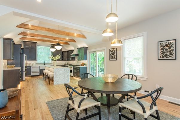 Dining room, Interior, Kitchen, Pendant Lights, Recessed Lighting, Stainless Steel Appliances, Wooden Beams, Wood Texture Flooring