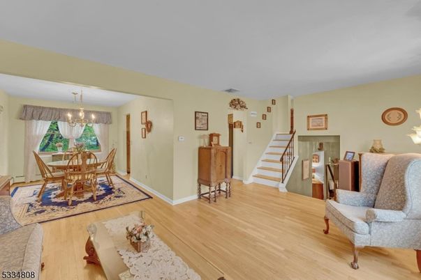 Chandelier, Dining room, Interior, Wood Texture Flooring