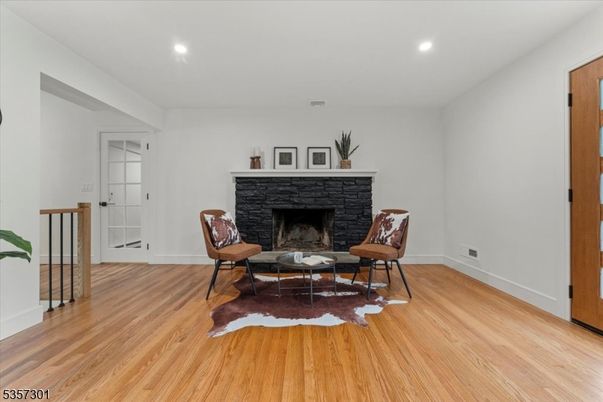 Fireplace, Interior, Recessed Lighting, Wood Texture Flooring