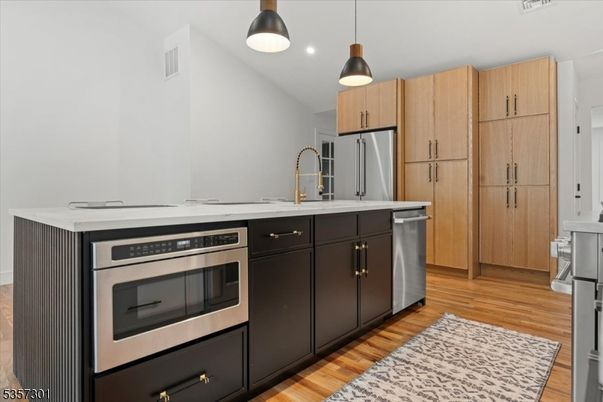 Interior, Kitchen, Pendant Lights, Recessed Lighting, Stainless Steel Appliances, Wood Texture Flooring