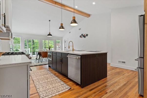 Dining room, Interior, Kitchen, Pendant Lights, Recessed Lighting, Stainless Steel Appliances, Wooden Beams, Wood Texture Flooring