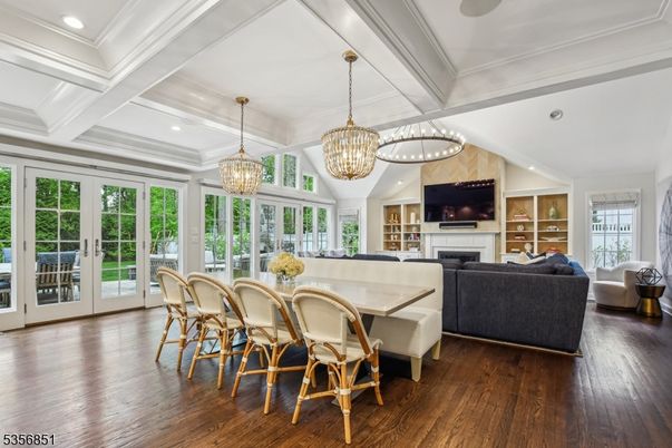 Chandelier, Dining room, Fireplace, Interior, Living room, Recessed Lighting, Wood Texture Flooring