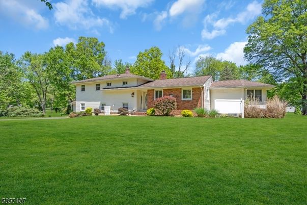Attached, Backyard, Exterior, Facade, Brick Facade, Ranch