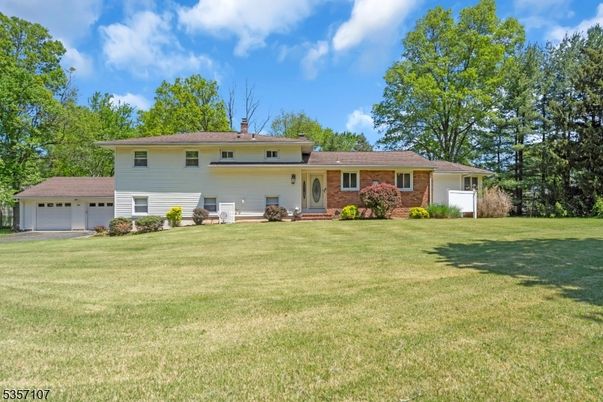 Attached, Backyard, Exterior, Facade, Brick Facade, Split Level