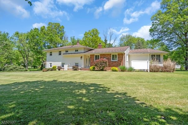 Attached, Backyard, Exterior, Facade, Brick Facade, Ranch