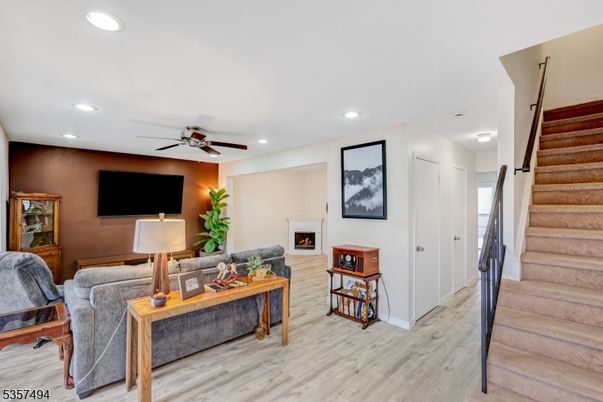 Fireplace, Interior, Living room, Recessed Lighting, Wood Texture Flooring