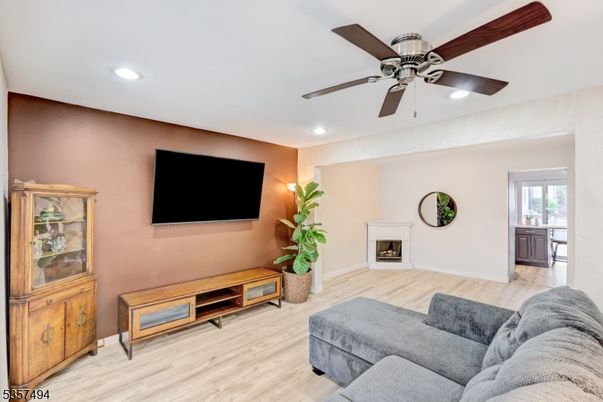Fireplace, Interior, Living room, Recessed Lighting, Wood Texture Flooring