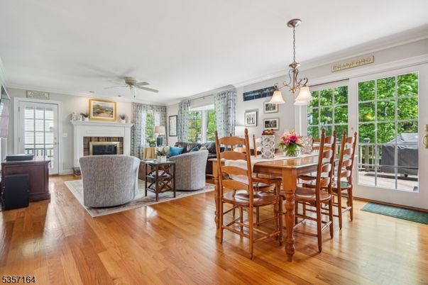 Dining room, Fireplace, Interior, Living room, Pendant Lights, Wood Texture Flooring