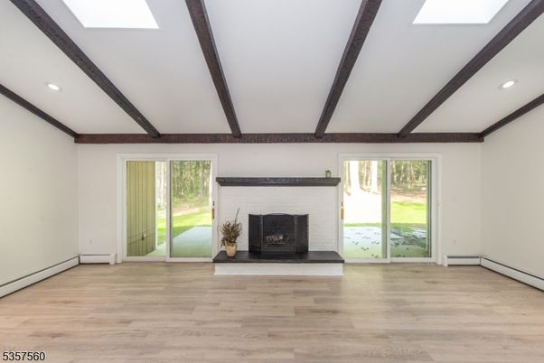 Empty room, Fireplace, Interior, Recessed Lighting, Wooden Beams, Wood Texture Flooring