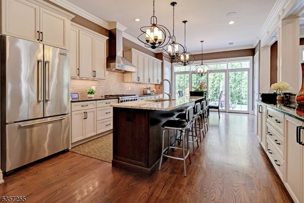 Chandelier, Interior, Kitchen, Pendant Lights, Recessed Lighting, Stainless Steel Appliances, Wood Texture Flooring