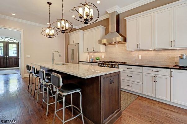 Chandelier, Interior, Kitchen, Pendant Lights, Recessed Lighting, Stainless Steel Appliances, Wood Texture Flooring