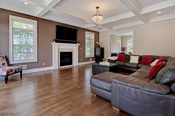 Chandelier, Fireplace, Interior, Living room, Recessed Lighting, Wood Texture Flooring