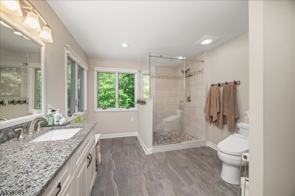 Bathroom, Glass Shower, Interior, Recessed Lighting, Wood Texture Flooring