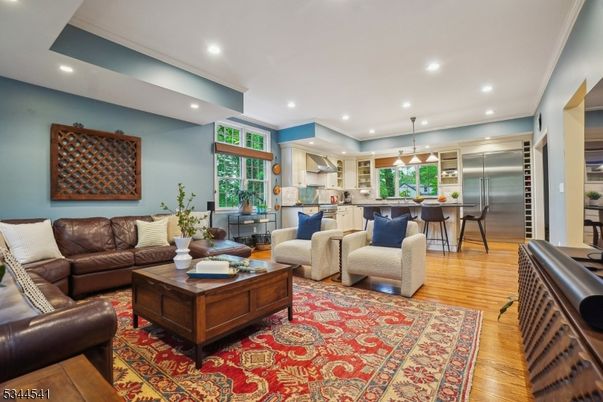 Dining room, Interior, Kitchen, Living room, Pendant Lights, Recessed Lighting, Stainless Steel Appliances, Wood Texture Flooring