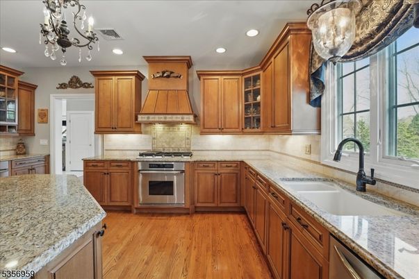 Chandelier, Interior, Kitchen, Recessed Lighting, Stainless Steel Appliances, Wood Texture Flooring