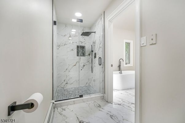 Bathroom, Free Standing Baths, Glass Shower, Interior, Marble, Marble Walls, Recessed Lighting