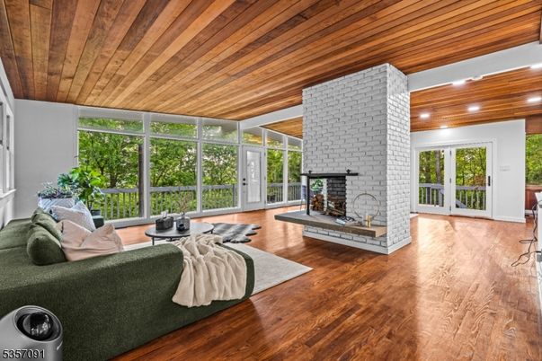 Fireplace, Interior, Living room, Recessed Lighting, Stone Walls, Wooden Ceilings, Wood Texture Flooring