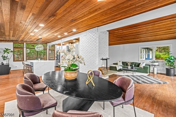 Dining room, Interior, Living room, Pendant Lights, Recessed Lighting, Stone Walls, Wooden Ceilings, Wood Texture Flooring
