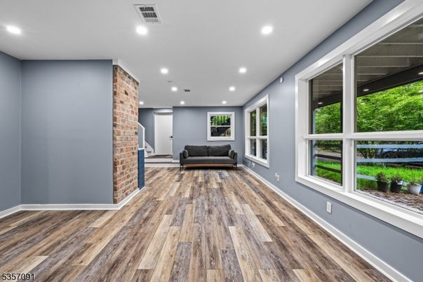 Empty room, Interior, Recessed Lighting, Stone Walls, Wood Texture Flooring