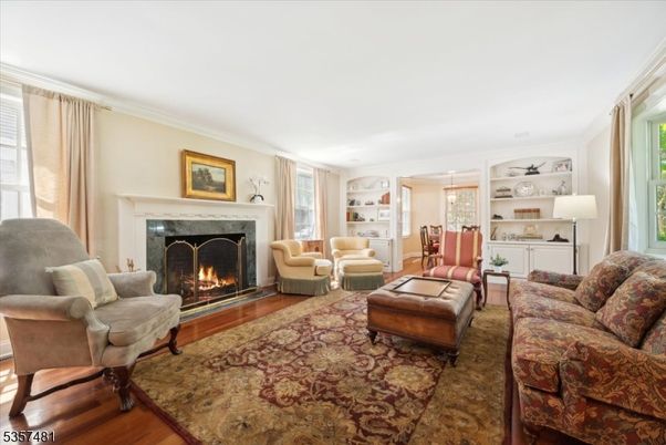 Chandelier, Dining room, Fireplace, Interior, Living room, Pendant Lights, Wood Texture Flooring