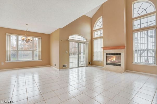 Chandelier, Empty room, Fireplace, Interior