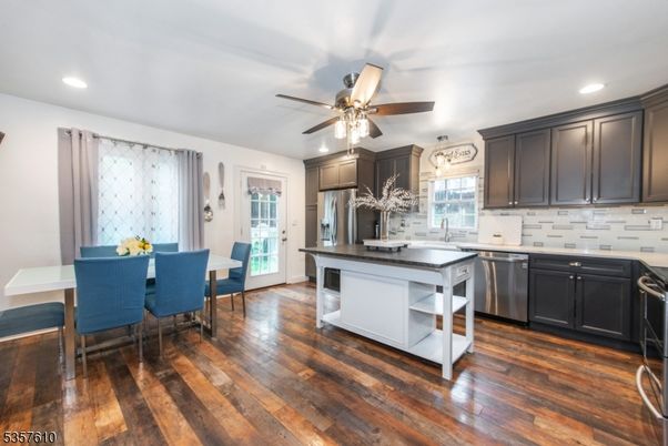 Dining room, Interior, Kitchen, Recessed Lighting, Stainless Steel Appliances, Wood Texture Flooring