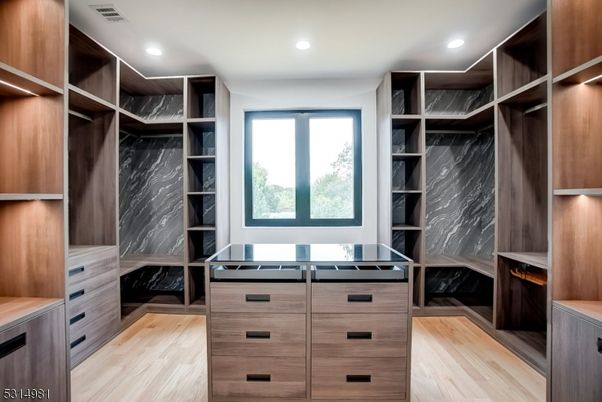 Interior, Marble Walls, Recessed Lighting, Walk-in Closets, Wood Texture Flooring