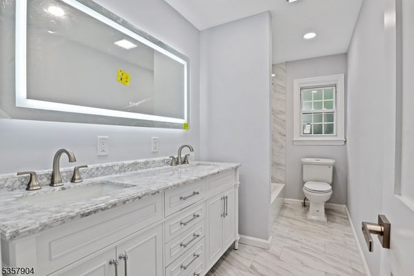 Bathroom, Dual Sink Vanities, Interior, Marble, Recessed Lighting