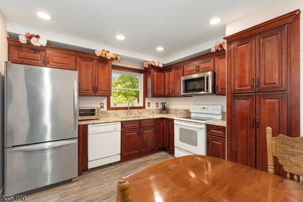 Interior, Kitchen, Recessed Lighting, Stainless Steel Appliances, Wood Texture Flooring