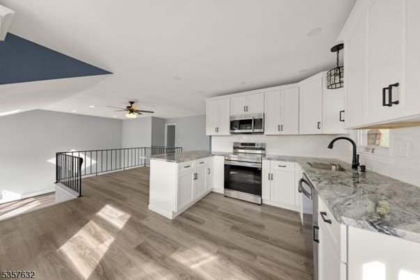 Interior, Kitchen, Pendant Lights, Recessed Lighting, Stainless Steel Appliances, Wood Texture Flooring