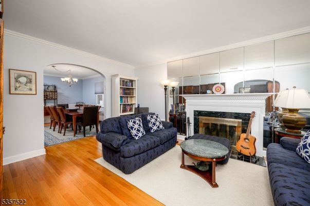 Chandelier, Dining room, Fireplace, Interior, Living room, Wood Texture Flooring