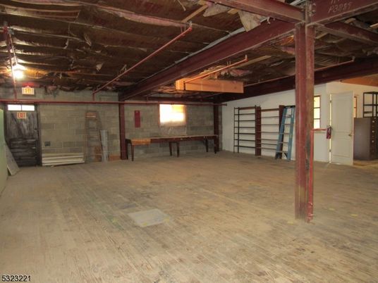 Garage, Interior, Stone Walls, Wooden Beams, Wood Texture Flooring