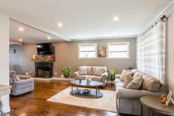 Fireplace, Interior, Living room, Recessed Lighting, Wood Texture Flooring