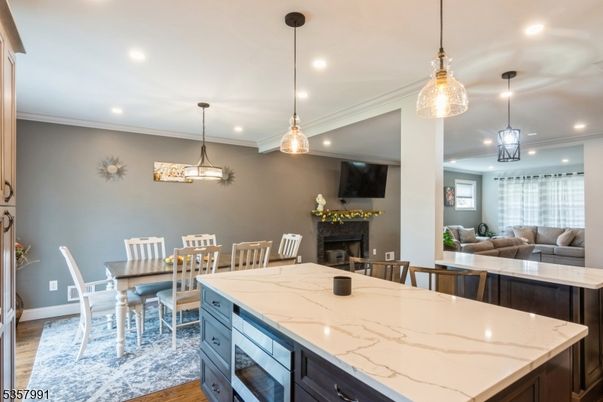 Dining room, Fireplace, Interior, Kitchen, Living room, Pendant Lights, Recessed Lighting, Wood Texture Flooring