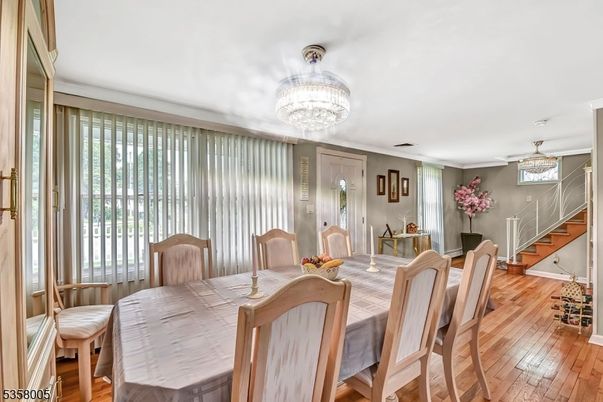 Chandelier, Dining room, Interior, Wood Texture Flooring
