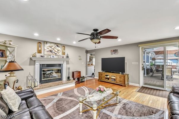 Fireplace, Interior, Living room, Recessed Lighting, Wood Texture Flooring