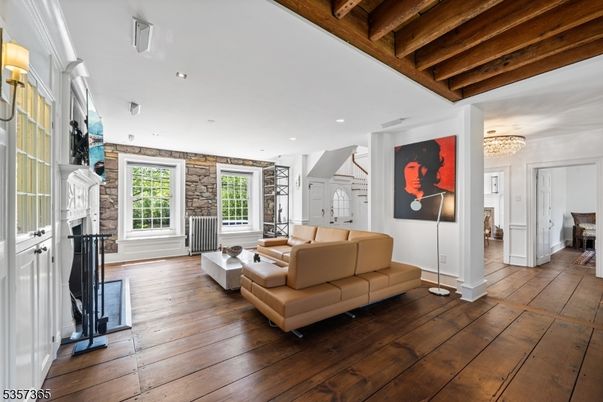 Chandelier, Fireplace, Interior, Living room, Recessed Lighting, Wooden Beams, Wooden Ceilings, Wood Texture Flooring