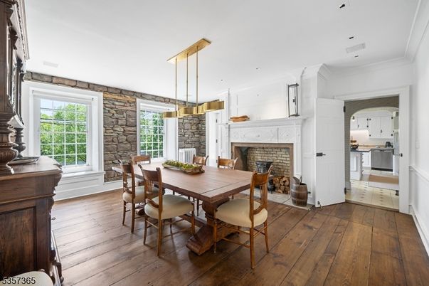 Dining room, Fireplace, Interior, Pendant Lights, Recessed Lighting, Wood Texture Flooring