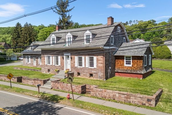 Exterior, Facade, Brick Facade, Cape Cod