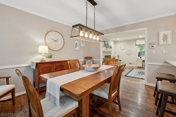 Dining room, Fireplace, Interior, Pendant Lights, Recessed Lighting, Wood Texture Flooring