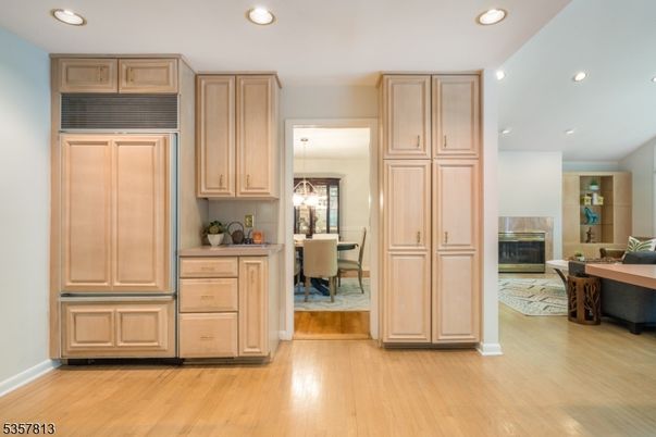 Dining room, Fireplace, Interior, Kitchen, Pendant Lights, Recessed Lighting, Wood Texture Flooring