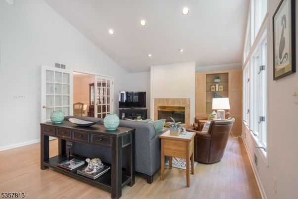 Fireplace, Interior, Living room, Recessed Lighting, Wood Texture Flooring