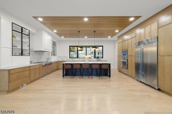 Interior, Kitchen, Marble Walls, Pendant Lights, Recessed Lighting, Stainless Steel Appliances, Wooden Ceilings, Wood Texture Flooring