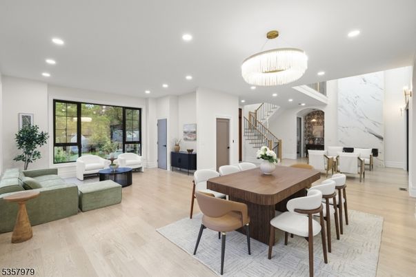 Chandelier, Dining room, Interior, Living room, Marble Walls, Recessed Lighting, Wood Texture Flooring