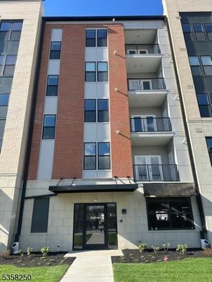 Exterior, Facade, Brick Facade, Condo Building