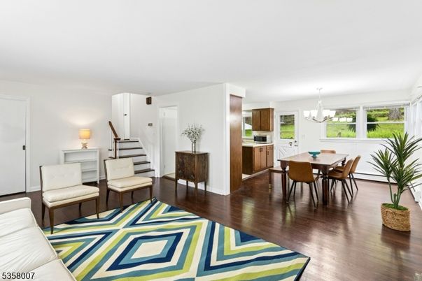 Chandelier, Dining room, Interior, Kitchen, Stainless Steel Appliances, Wood Texture Flooring