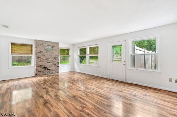 Empty room, Fireplace, Interior, Stone Walls, Wood Texture Flooring